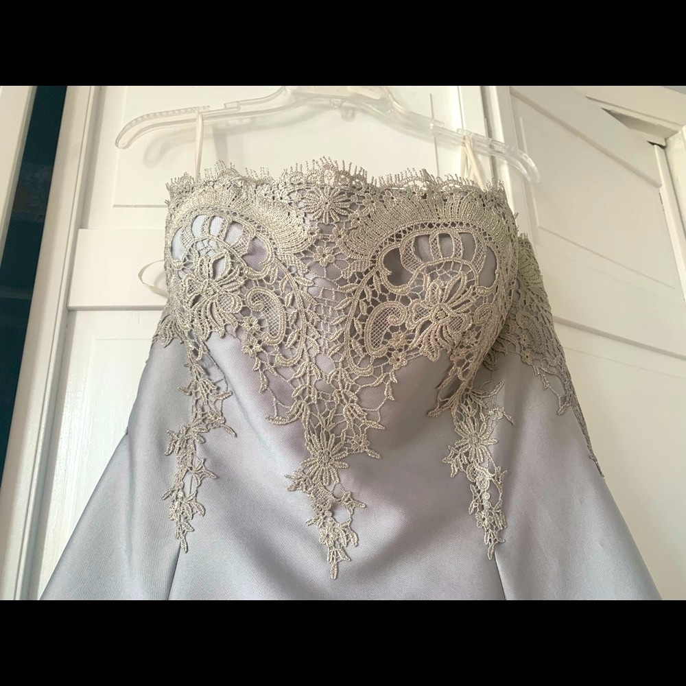 New Silver strapless high, low gown with lace detail